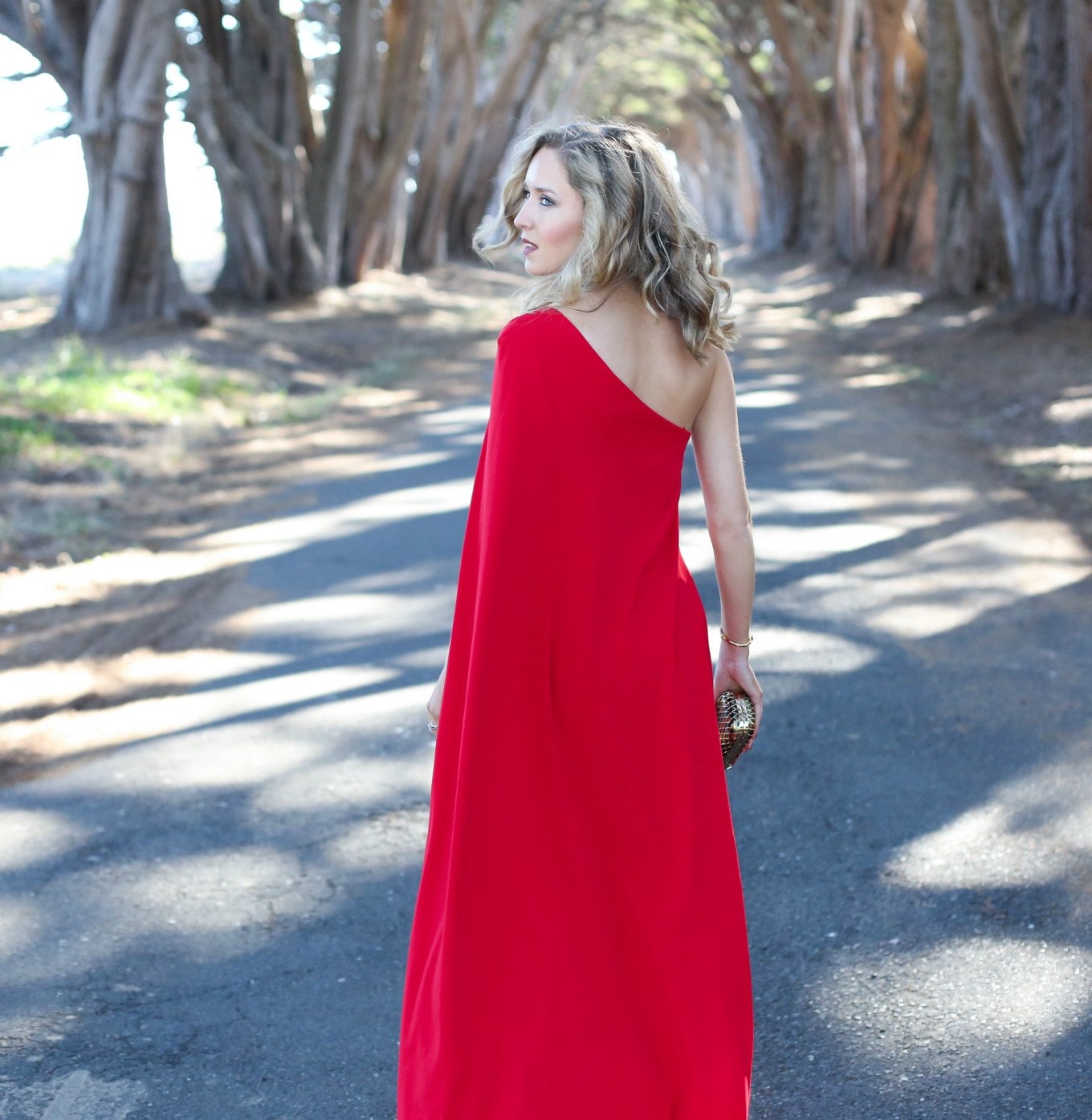 red one shoulder gown for holiday party