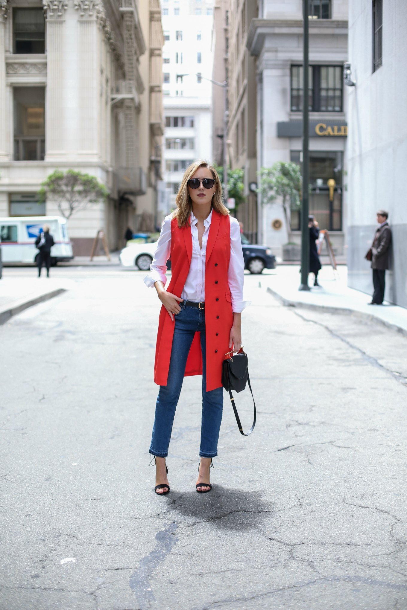 classic white shirt red vest jeans