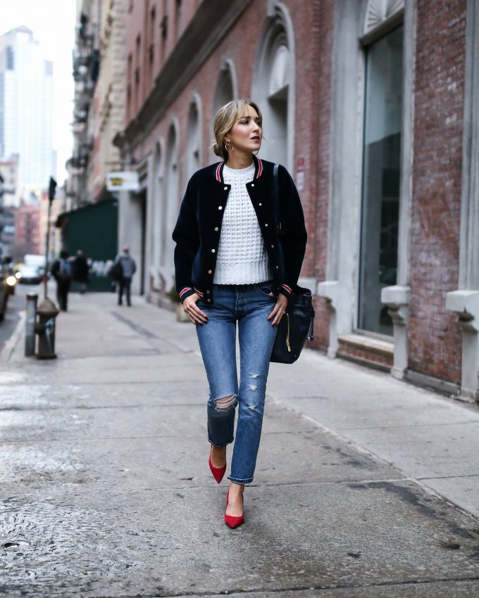 ripped jeans red heels TH bomber 
