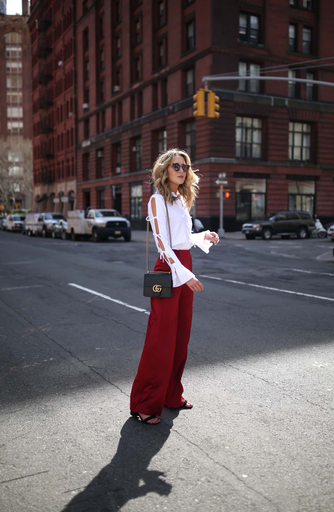 spring-summer-trends-statement-sleeves-split-ties-bell-red-satin-wide-leg-pants-alice-olivia-jonathan-simkhai-cat-eye-sunglasses1