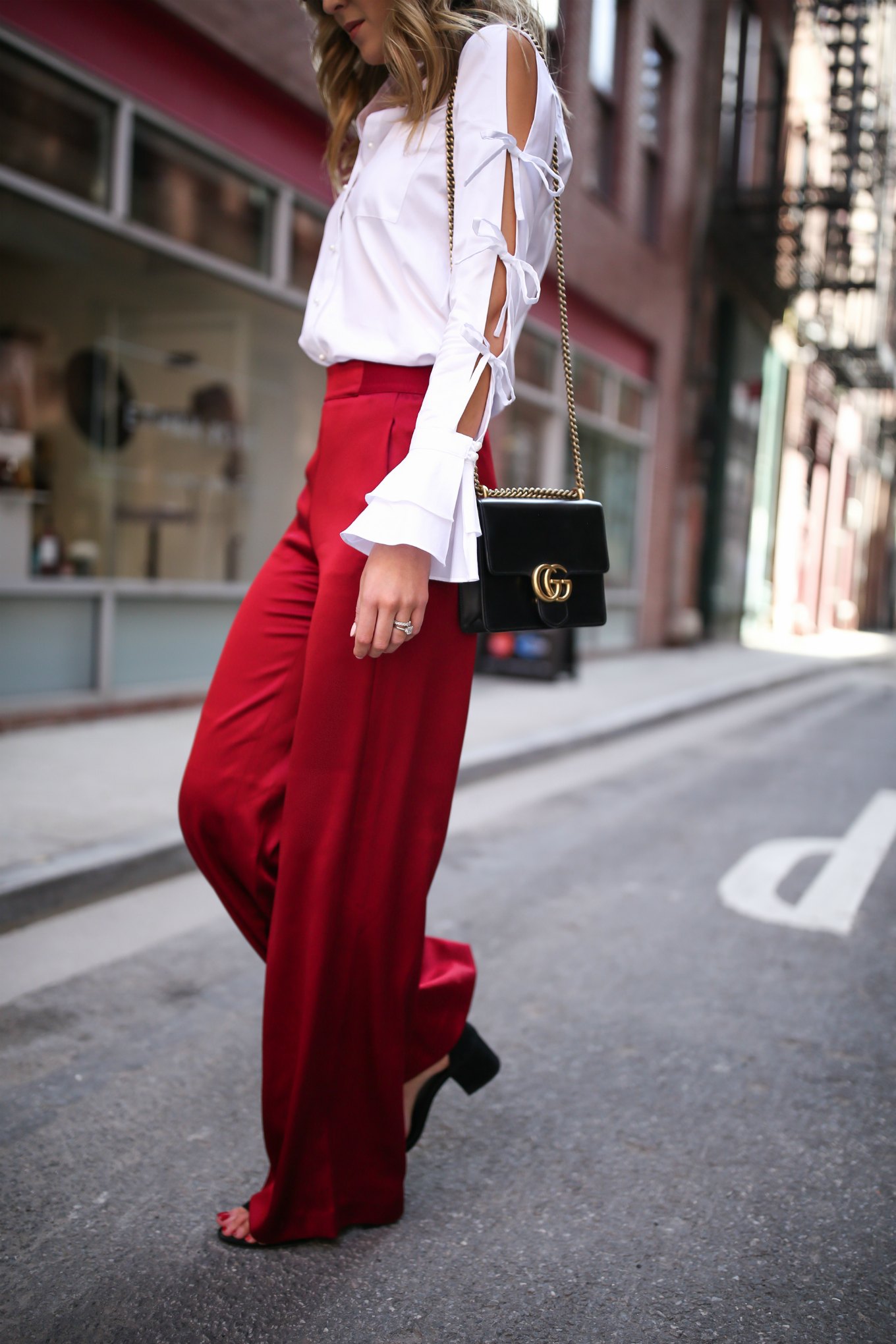 spring-summer-trends-statement-sleeves-split-ties-bell-red-satin-wide-leg-pants-alice-olivia-jonathan-simkhai-cat-eye-sunglasses10
