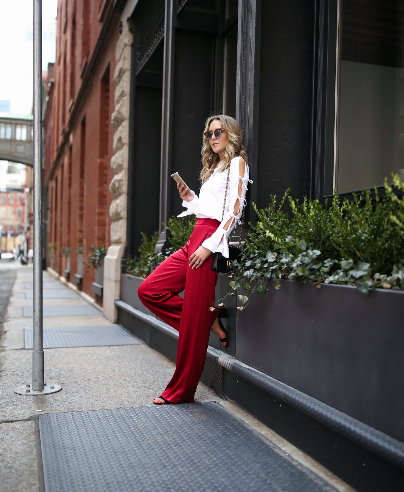 spring-summer-trends-statement-sleeves-split-ties-bell-red-satin-wide-leg-pants-alice-olivia-jonathan-simkhai-cat-eye-sunglasses14