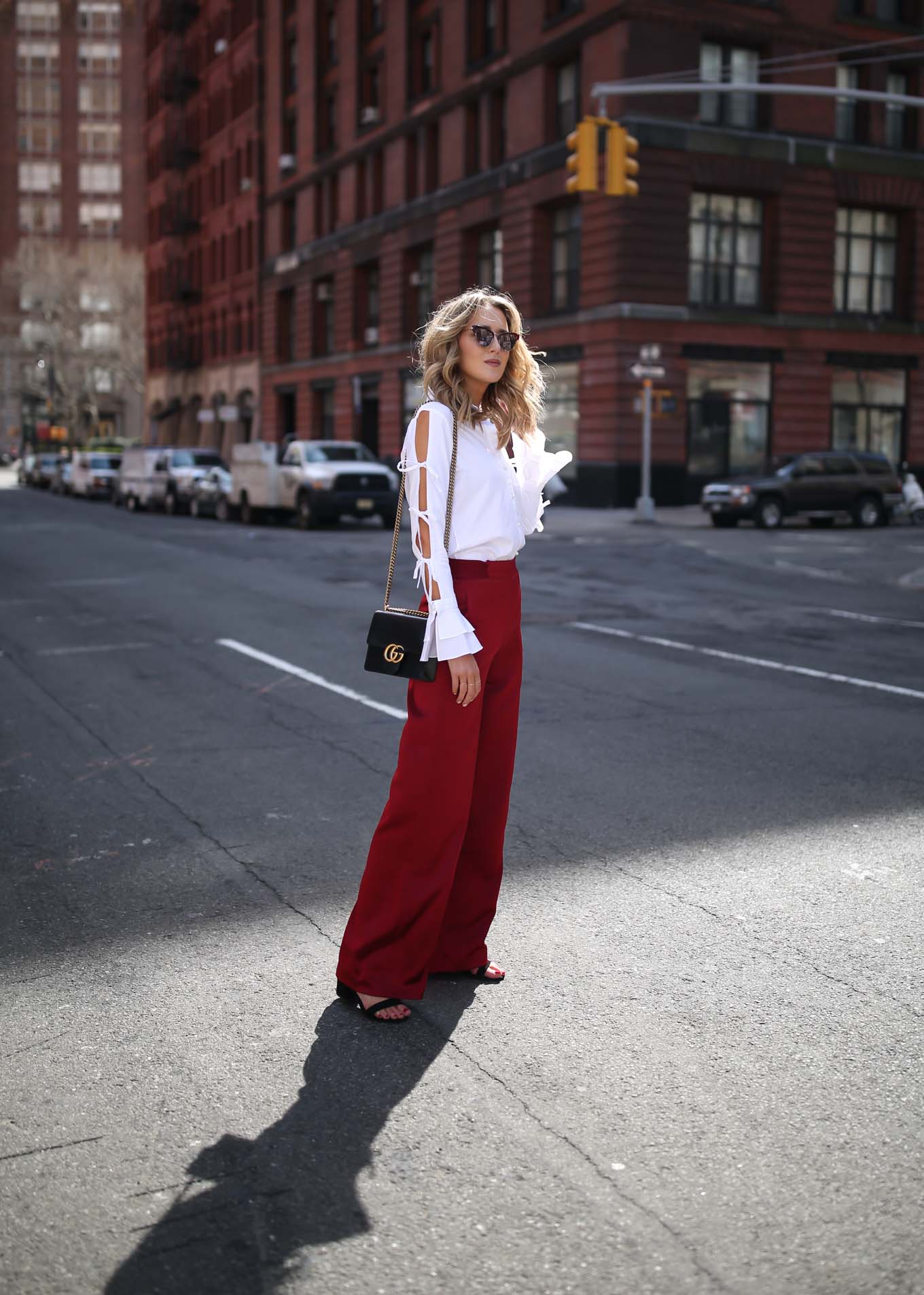 spring-summer-trends-statement-sleeves-split-ties-bell-red-satin-wide-leg-pants-alice-olivia-jonathan-simkhai-cat-eye-sunglasses2