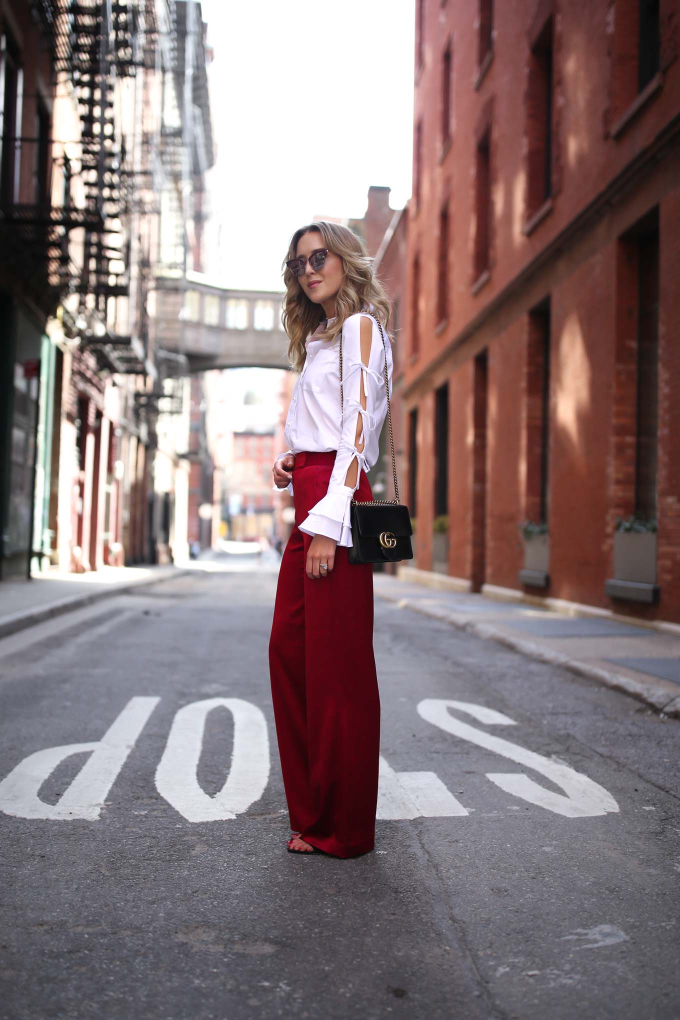 spring-summer-trends-statement-sleeves-split-ties-bell-red-satin-wide-leg-pants-alice-olivia-jonathan-simkhai-cat-eye-sunglasses8