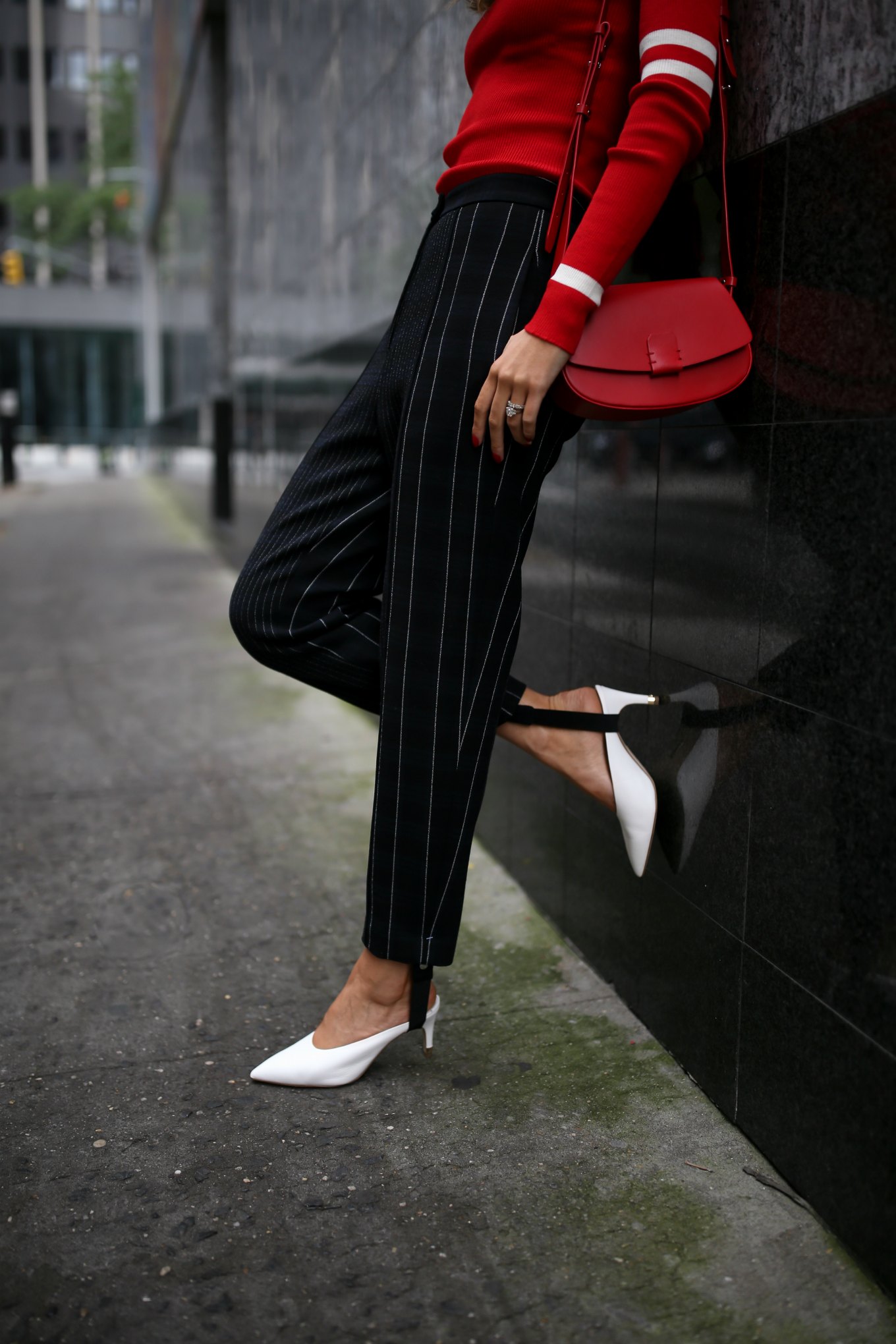 NYC fashion blogger wearing red Maggie Marilyn striped turtleneck Phillip Lim pinstriped stirrup pants white slide pumps silver disc earringws red crossbody bag black cat eye sunglasses fall winter 2017 trends aprés ski
