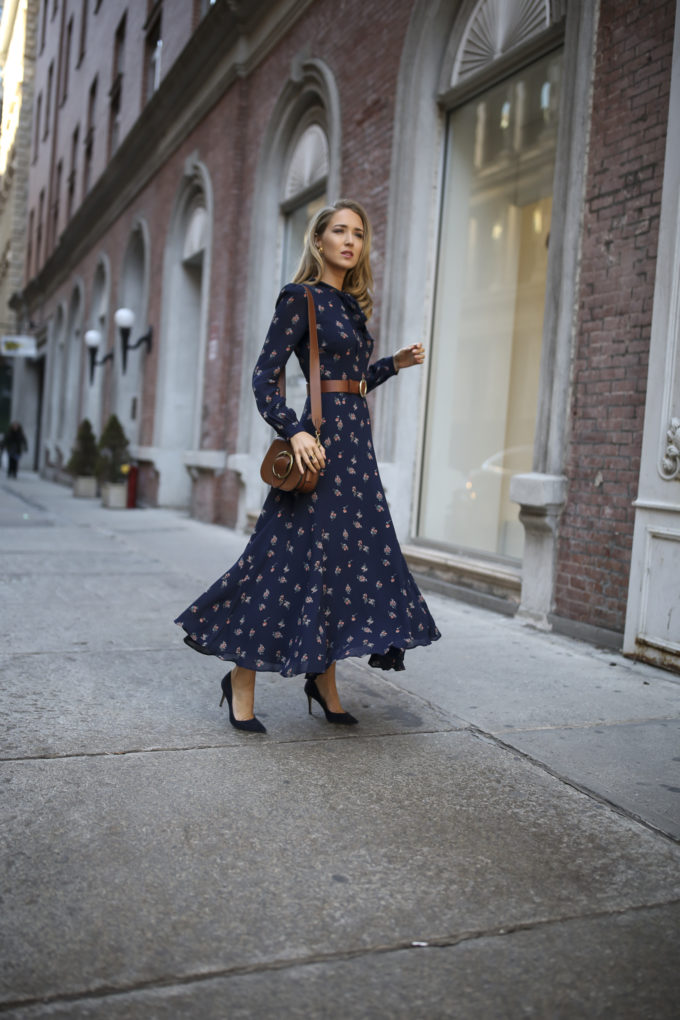 NYC fashion blogger Mary Orton of Memorandum wears a Reformation floral neck tie maxi dress, classic black ankle-strap pumps, a brown leather circle belt, and a brown leather Ralph Lauren cross body bag to meet the parents