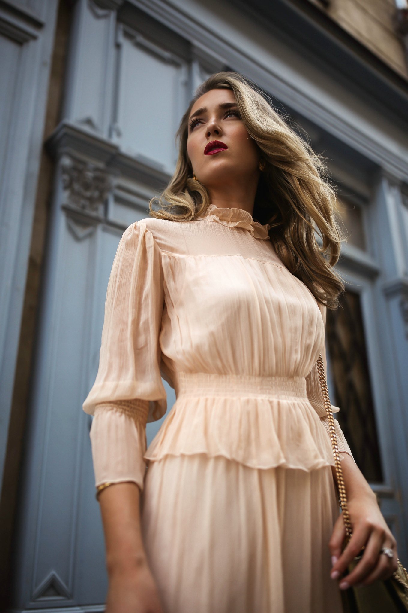 woman wearing a peach dress woman wearing a peach dress